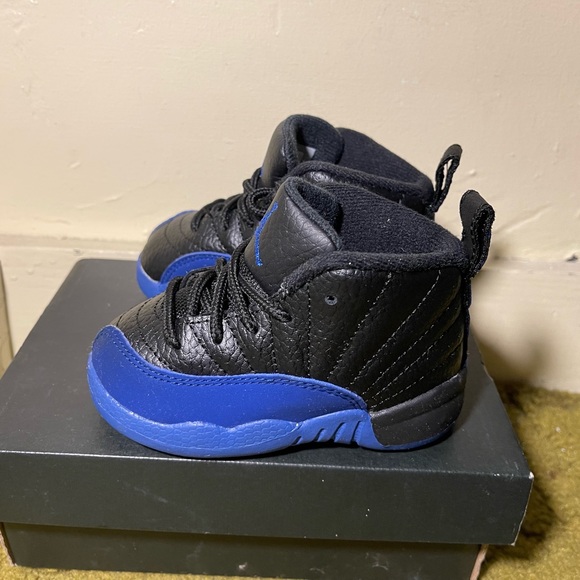 Jordan 12 Retro
Black Game Royal
(TD) Worn once to a birthday party - Picture 3 of 6